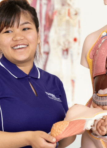 Work Integrated Learning Student with anatomy figure | Think Education