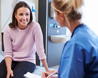 Nursing | Nurse Speaking to Client | Think Education