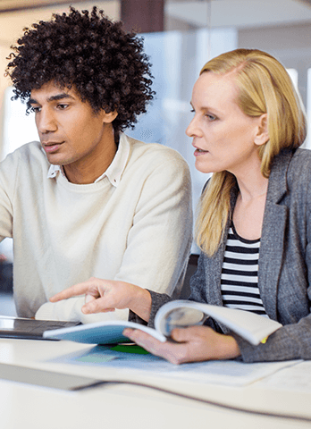 Our Impact | Employability Strategy | Man and Woman Laptop