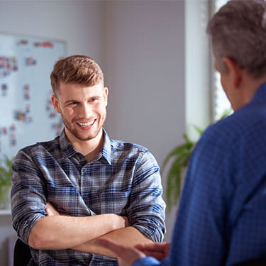 Early Entry Program | THINK Education | Two Men Talking | Large