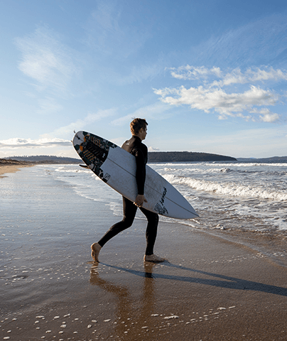 How to Apply | Study in Australia | Man with Surfboard