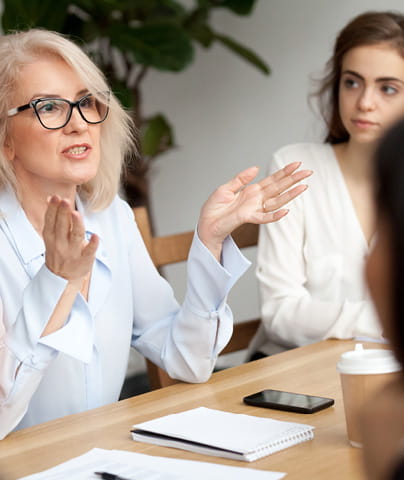 Employability | Our Impact | Woman Discussing | Think Education